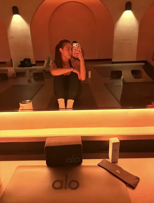 Grounded Pilates founder in a Pilates studio